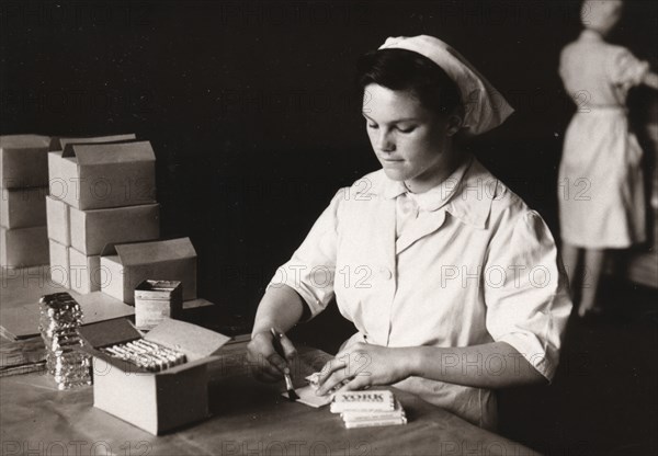 Women pasting York Chocolate, Rowntree factory, York, Yorkshire, 1949. Artist: Unknown