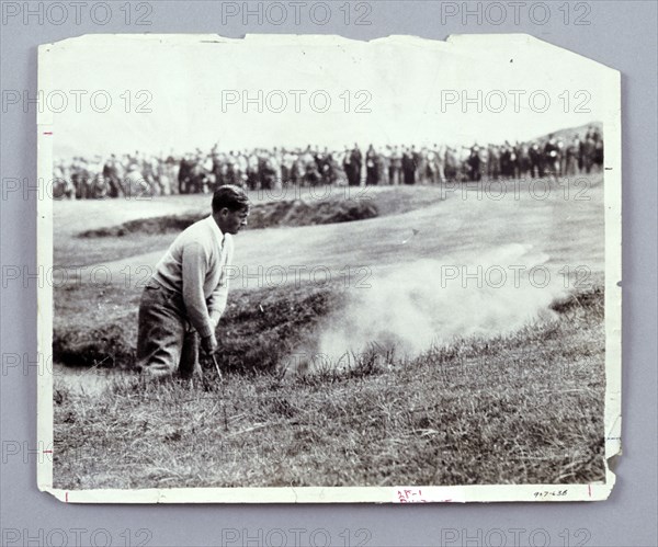 Bobby Jones playing his way out of a bunker, c1920s. Artist: Unknown
