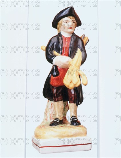 Staffordshire golfing figure, c1900. Artist: Unknown