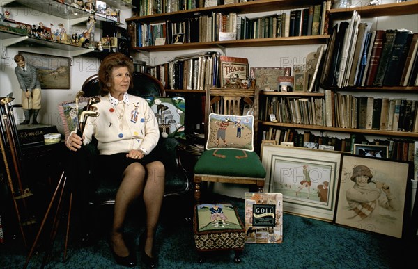 Author Sarah Fabian Baddiel at home with some of her golfing collection. Artist: Unknown