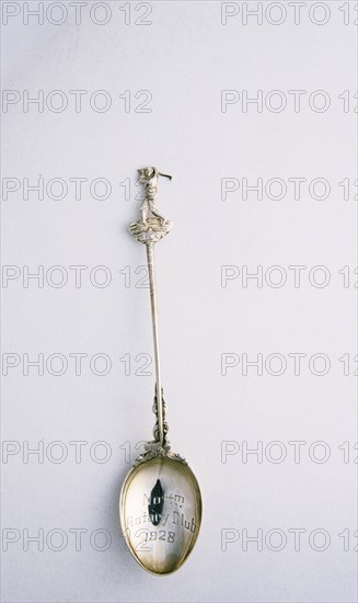 Silver spoon with golfer motif, British, c1910-c1930. Artist: Unknown