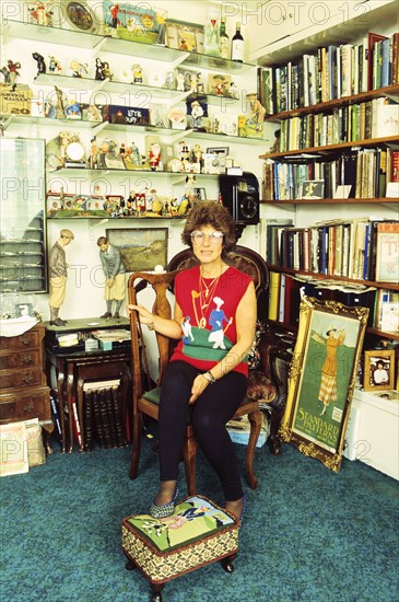 Author Sarah Fabian Baddiel at home with some of her collection of golf memorabilia Artist: Unknown