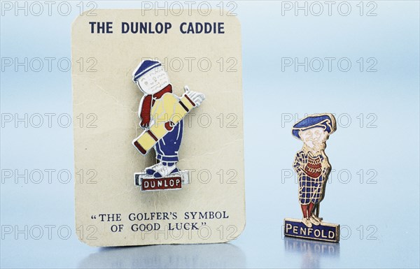 Dunlop 'caddie' brooch and Penfold pin, British, 1920s. Artist: Unknown