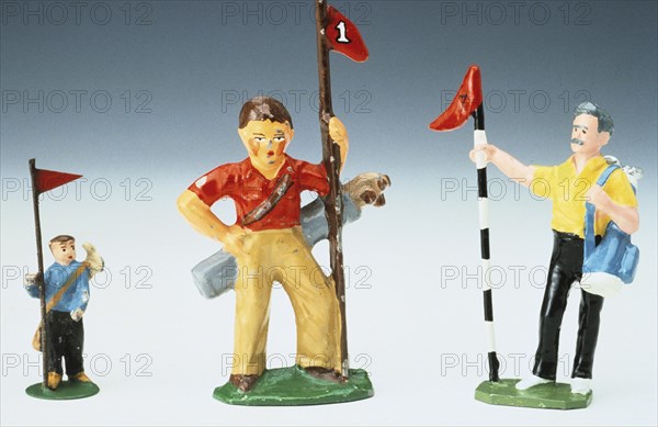 Lead golf caddy figures, 20th century. Artist: Unknown