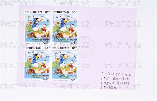Donald Duck playing golf, postage stamps, Bhutan, 1984. Artist: Unknown