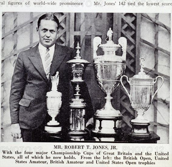 Bobby Jones (1902-72), American golfer, with Grand Slam trophies, 1930. Artist: Unknown