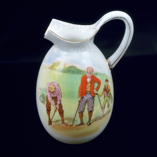 Foley/Shelley small cream jug with image of two golfers and caddy, c1930. Artist: Unknown