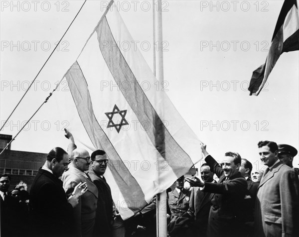 Abba Eban (1915-2002), at the raising of the Israeli flag at UN, 1949. Artist: Unknown