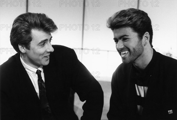 George Michael, British pop singer, and Jonathan Ross, British comedian and TV personality. Artist: Unknown