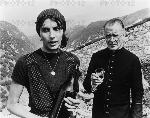 Sir John Mills (1908-), British actor, and Paola Pitagora (1942- ), Italian actress, 1977. Artist: Unknown