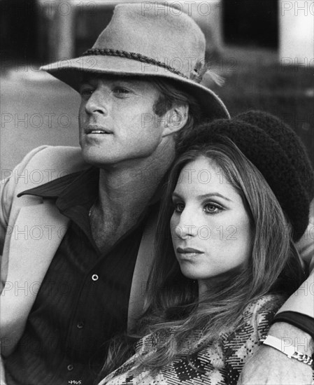 Barbara Streisand (1942-), American singer and actress with Robert Redford (1937-), 1973. Artist: Unknown