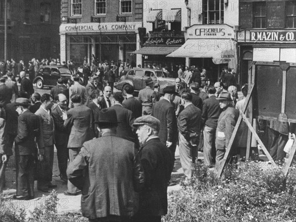 Jewish tailors looking for employment, Whitechapel Road, London, c1940s. Artist: Unknown