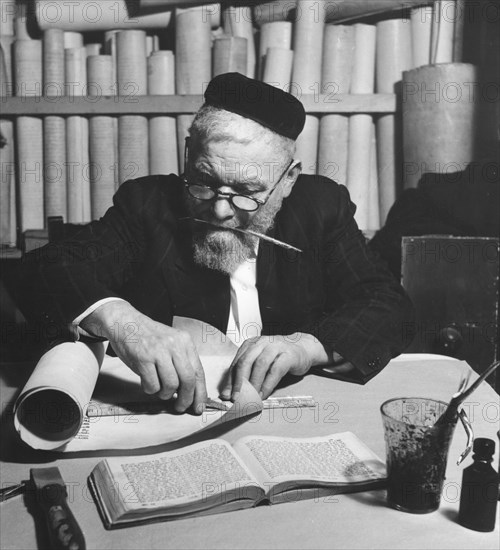 Working on a parchment scroll for a Torah, 1974. Artist: Unknown