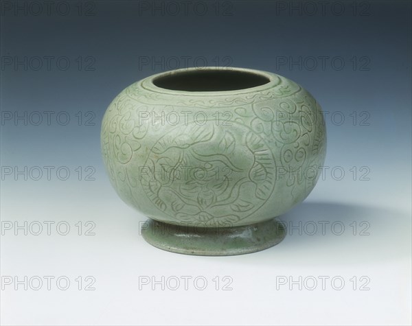 Yue celadon jar with mandarin ducks in lotus medallions, late Tang dynasty, China, 9th-10th century. Artist: Unknown