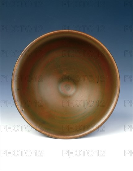 Yaozhou stoneware tea bowl with persimmon red glaze, Jin dynasty, China, 12th century. Artist: Unknown