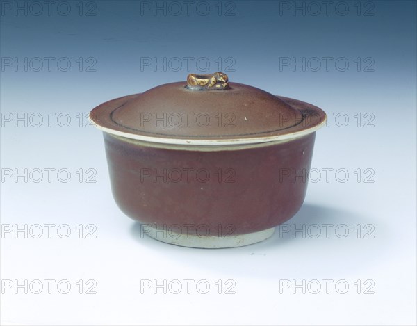 Ding persimmon red glazed covered bowl with white glazed interior, Jin dynasty, China, 12th century. Artist: Unknown