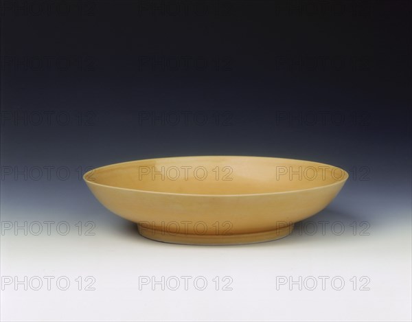 Imperial yellow glazed saucer, Yongzheng period, Qing dynasty, China, 1723-1735. Artist: Unknown