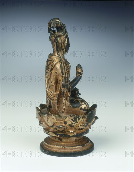 Gilt bronze statue of bodhisattva on lotus seat, Liao dynasty, China, mid 11th century. Artist: Unknown