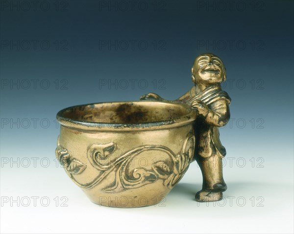 Gilt bronze water container with boy holding the rim, Ming dynasty, China, c early 16th century. Artist: Unknown