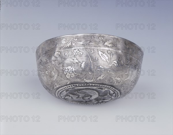 Silver bowl with animals, birds and dragon, High Tang period, China, 8th century. Artist: Unknown