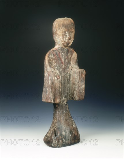 Camphor wood standing female figure, China, c206 BC-c8 AD. Artist: Unknown
