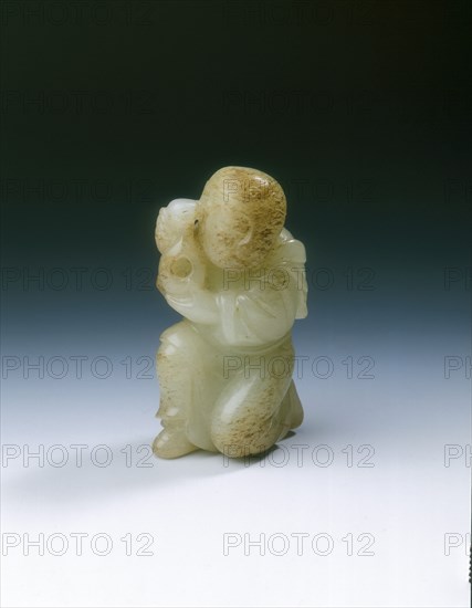 Yellowish jade kneeling tribute bearer, Tang or Liao dynasty, China, 8th-11th century. Artist: Unknown
