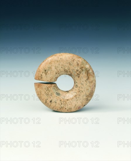 Circular jade bead, neolithic, Chahai type, northern China, c4700-3000 BC. Artist: Unknown