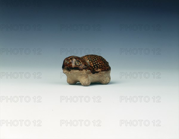 Brown pottery toad-like animal, Tang dynasty, China, 618-907 AD. Artist: Unknown