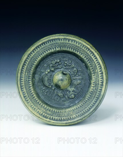 Bronze mirror with two dragons, Han dynasty, China, 206 BC-220 AD. Artist: Unknown