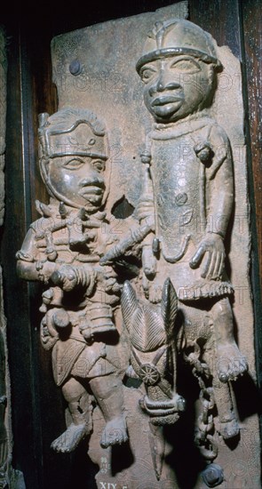 Brass plaque showing the Oba of Benin with attendants, Edo, Benin, Nigeria, 16th century. Artist: Unknown