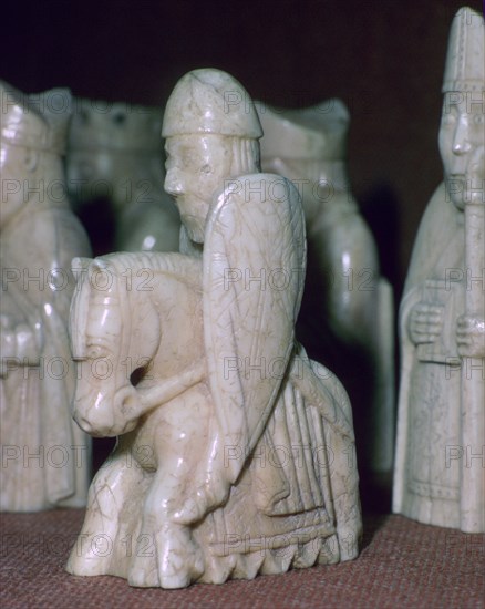 A Knight - The Lewis Chessmen, (Norwegian?), c1150-c1200. Artist: Unknown