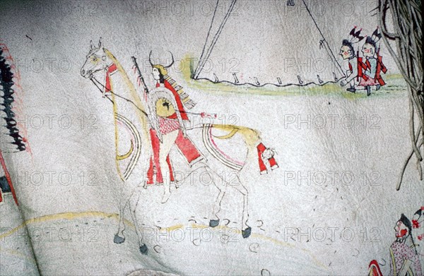North American Indian decorated skin, showing a horse and rider, from the Arapaho tribe.