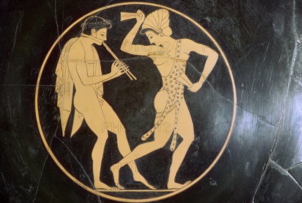 Vase-painting of a youth playing the flute and a woman dancing, 6th century BC. Artist: Epikektos
