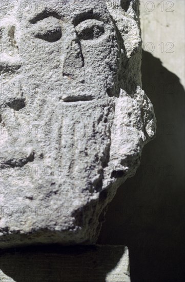 Detail of a stone head in Penmon Priory. Artist: Unknown