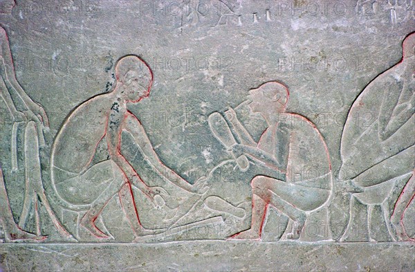 Egyptian relief showing shoemakers, 14th century BC Artist: Unknown