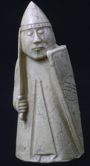 A Knight - The Lewis Chessmen, (Norwegian?), c1150-c1200. Artist: Unknown