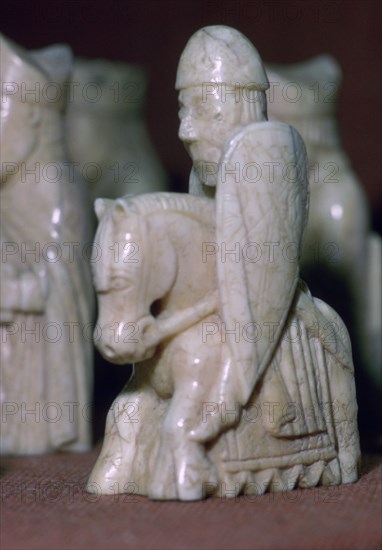 A Knight - The Lewis Chessmen, (Norwegian?), c1150-c1200. Artist: Unknown