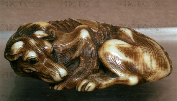 Japanese Netsuke of a dog, 19th century. Artist: Unknown