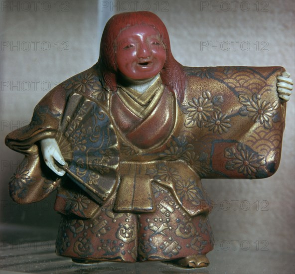 Japanese Netsuke of a No dancer as a Shojo. Artist: Masahira