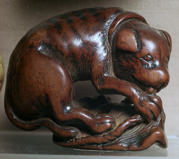 Japanese Netsuke of a dog. Artist: Unknown