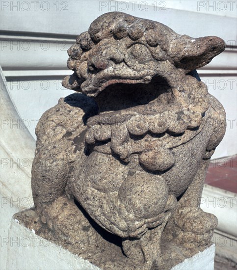 Lion guardian on the steps of a Buddhist temple. Artist: Unknown