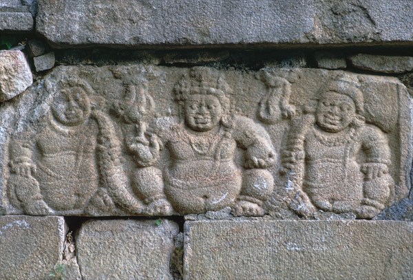 Dwarf figures on a building in the Buddhist city of Anuradhapura. Artist: Unknown