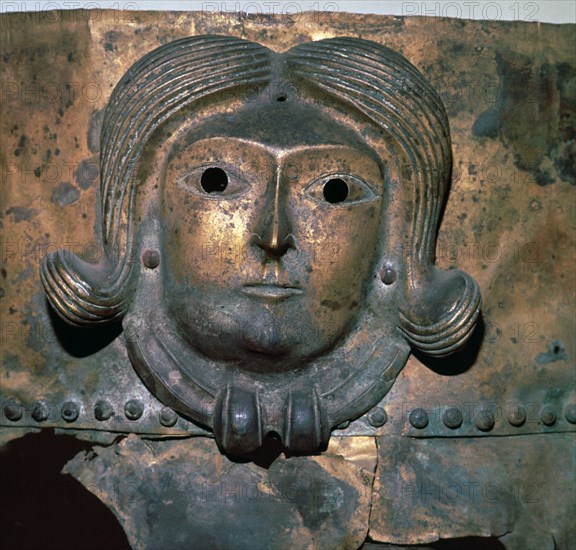 Detail of a bronze cauldron showing a human head wearing a Celtic torc, 4th century BC. Artist: Unknown