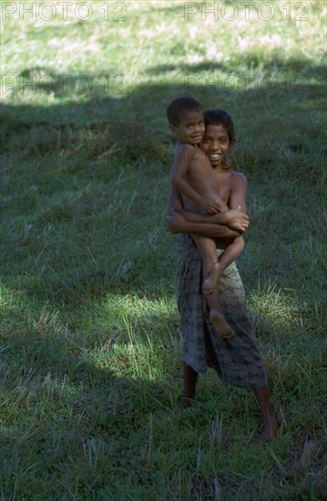 Sri Lankan children. Artist: CM Dixon Artist: Unknown