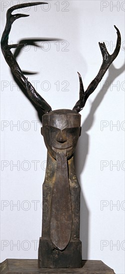 Chinese wooden sculpture of an antlered head. Artist: Unknown