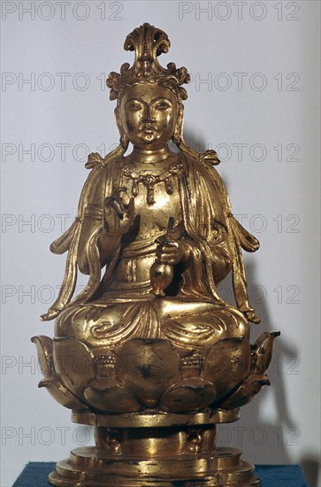 A gilt-bronze statuette of a Bodhisattva on a lotus leaf, 10th century. Artist: Unknown