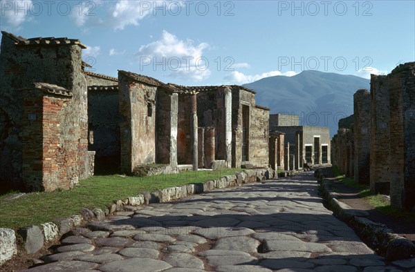 Street scene in Pompeii with Vesuvius in the background, 1st century. Creator: Unknown.