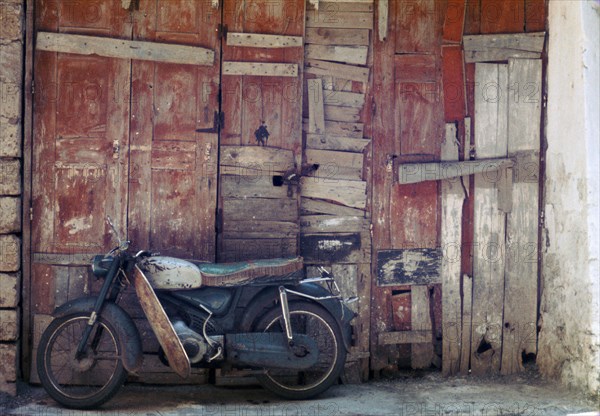 Motorcycle in the street in Khania. Artist: Unknown