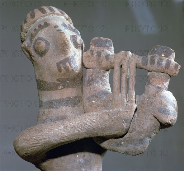 Minoan terracotta figure of a lyre-player, 8th century BC. Artist: Unknown
