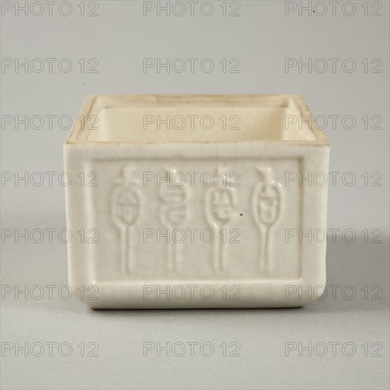 Soft paste rectangular vessel with characters in relief, early 19th century. Artist: Unknown.